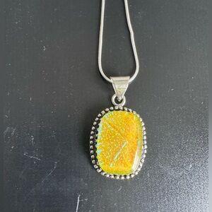 Elegant Silver and Gold Pendant Necklace